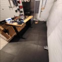 foam mats over concrete in basement workshop