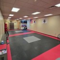 red, black and gray karate mats