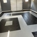 home gym with black and gray staylock orange peel tiles