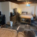 black and gray foam mats in basement
