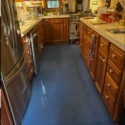 blue foam tiles installed in home kitchen