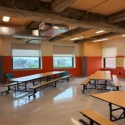 school cafeteria with orange wall pads