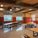 school cafeteria with orange wall pads