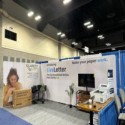gray wood grain foam tiles at trade show booth