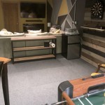 family room with removable carpet squares for wet basement thumbnail