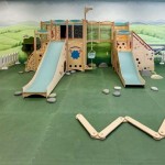 indoor playground for kids inside a cafe with foam mat flooring thumbnail