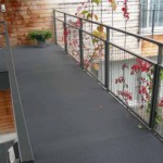 Roofing mats for rooftop access walkways on commercial rooftop areas.