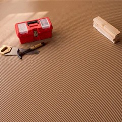 Sandstone G-Floor Ribbed Tread Vinyl Multipurpose Roll 55 mil x 5x10 Ft. with carpenter tools