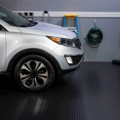 G-Floor Coin Tread Garage Floor Roll 75 Mil x 8.6x24 Ft. in midnight black with SUV parked on mat