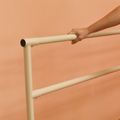 Portable Ballet Dance Barre 6 Ft. persons hand on barre