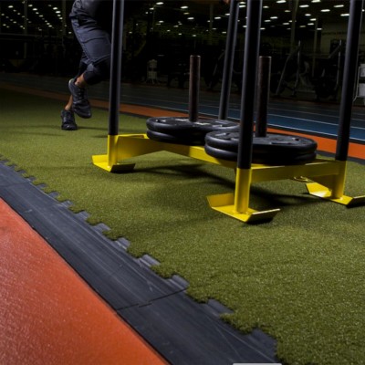 RageTurf Rally Interlocking Turf Tiles 23 x 46 Inch x 24 mm Weight Sled being Pushed