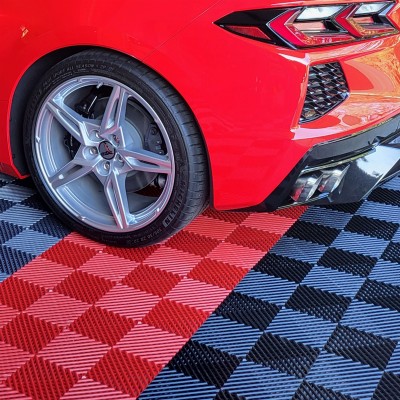 perforated garage floor tiles with corvette in garage