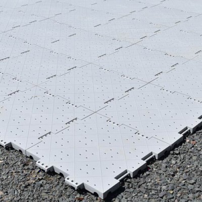 Portable Outdoor Tile 12x12 Inch Gray assembled over top of gravel