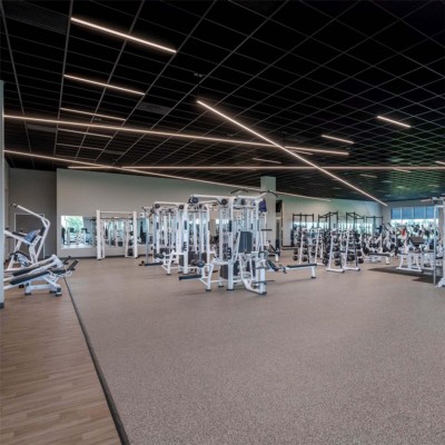 Rubber Gym Flooring Square Tiles Domination 38 x 38 Inch x 12mm grit gray installed in large fitness center
