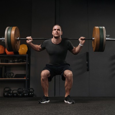 Rolled Rubber three eighths Inch Eco Regrind Roll under man doing backsquats