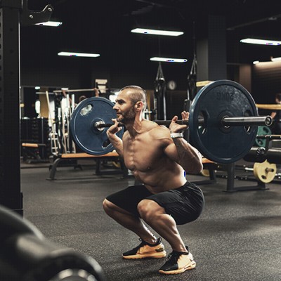 Athlete deadlifting on 3/8 thick Pacific rolled rubber flooring