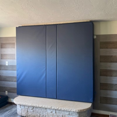 Safety Wall Pad 1x7 Ft x 2 Inch with other wall pads installed over fireplace