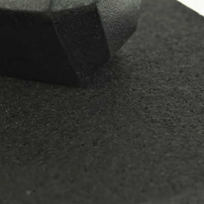 Straight Edge Rubber Floor Tiles Black 3/8 Inch x 2x2 Ft. Pacific close up with dumbbell