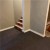 12 x 12 gray Basement Carpet Tiles over concrete by steps