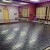 black flat top interlocking tiles used for dance studio floor