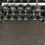 ForceFit Athletic Rolled Rubber 10% Color 3/8 Inch x 4 Ft. Wide Per SF dumbbells on weight rack