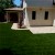 Endless Summer Landscaping Turf in backyard with spanish style home