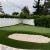 Troon Artificial Turf in backyard mini golf course featuring a putting and chipping area with sand trap