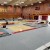 Gym Floor Covering Carpet Tile marauders workers install in school gym