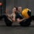 Rolled Rubber three eighths 20 percent color with man and woman using medicine ball