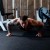Man Doing Pushups on Rolled Rubber Flooring
