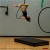 Aerial Ring Crash Mat with Acrobat Upside Down