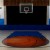 Safety Stage Pads - Hook and Loop Top Return 36-48 in. W x 48 in. ID royal blue over basketball hoop