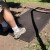 commercial brown playground rubber swing mats underneath swing on dirt