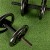 thick padded gym turf tile with weights top view