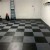 black and gray interlocking tiles in garage